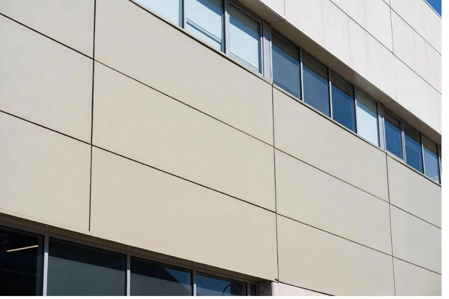 Color consistency across large aluminum composite panel facade in architectural project