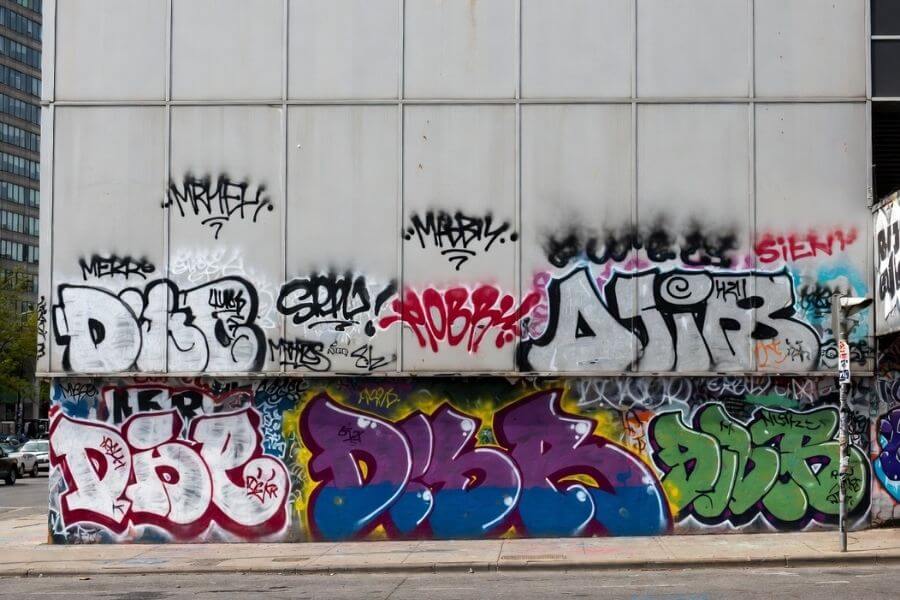 graffiti on aluminum composite panels facade urban building damage